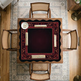 Square burgundy mahjong mat with a cherry blossom floral border and a dark open center.
