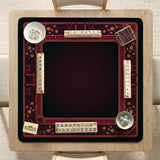 Square burgundy mahjong mat with a cherry blossom floral border and a dark open center.