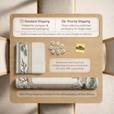 Square mahjong table mat with a cream center and a border design of cranes, bamboo, plum blossoms, and a geometric frame in sage green and warm gold.