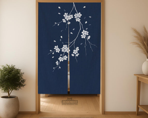Navy door curtain with pink cherry blossom branches and a light floral layout on a dark background.