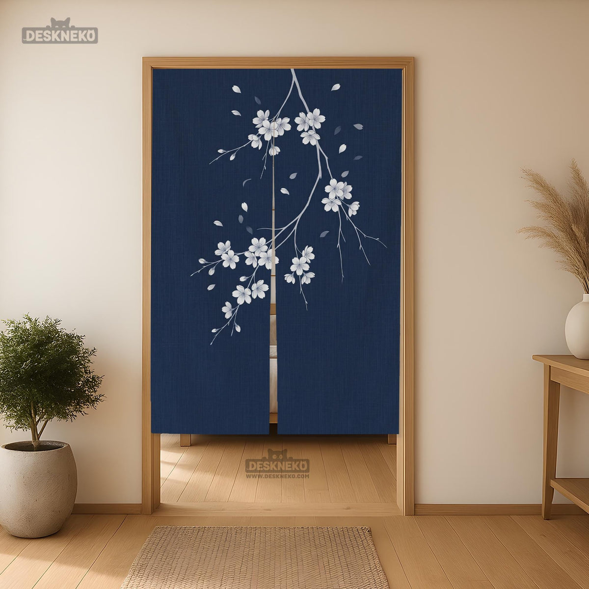 Navy door curtain with pink cherry blossom branches and a light floral layout on a dark background.