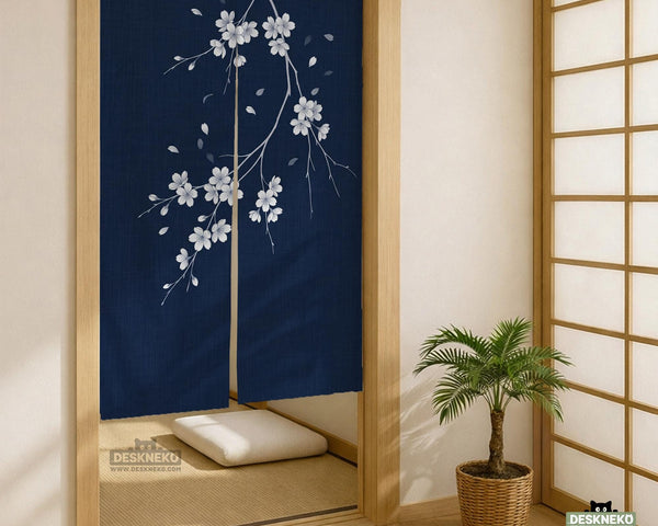 Navy door curtain with pink cherry blossom branches and a light floral layout on a dark background.