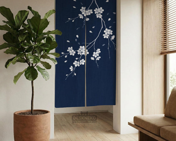 Navy door curtain with pink cherry blossom branches and a light floral layout on a dark background.