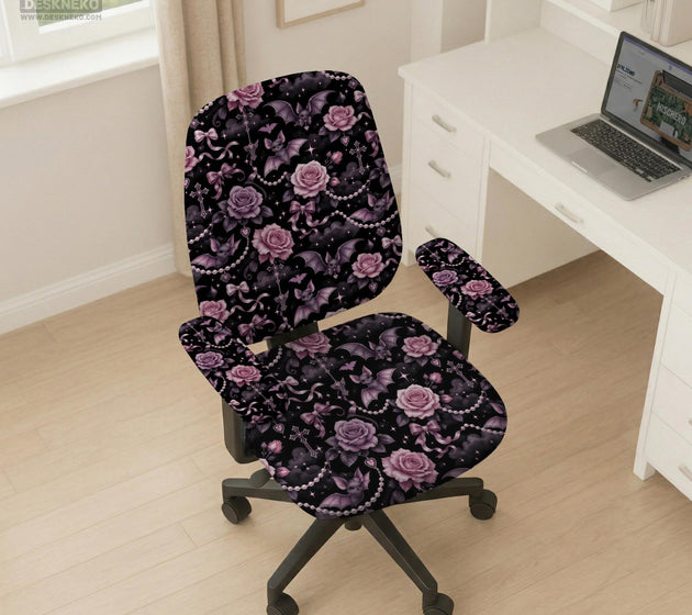 Desk chair cover design with pink roses, small bats, moons, pearls, and ribbon details on a black background.