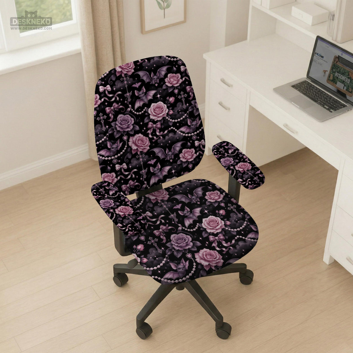 Desk chair cover design with pink roses, small bats, moons, pearls, and ribbon details on a black background.