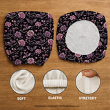 Desk chair cover design with pink roses, small bats, moons, pearls, and ribbon details on a black background.