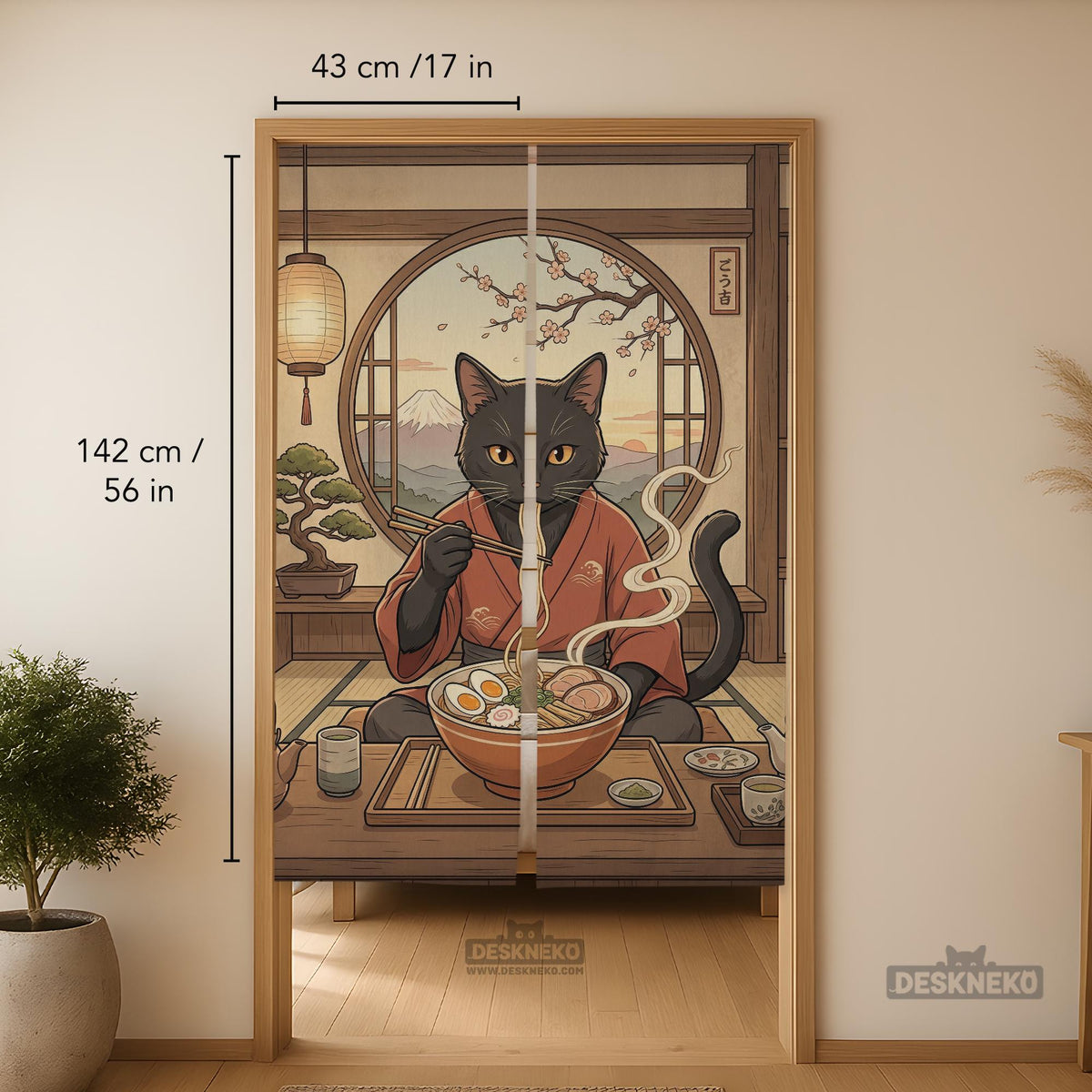 A decorative door curtain with a black cat design, cherry blossoms, and warm neutral background tones.