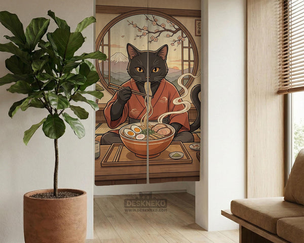 A decorative door curtain with a black cat design, cherry blossoms, and warm neutral background tones.