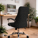 Desk chair cover in black with a small gold star pattern shown on a swivel chair.