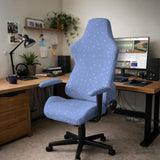 Blue desk chair cover with a celestial star and moon pattern shown in multiple coverage options for a chair.