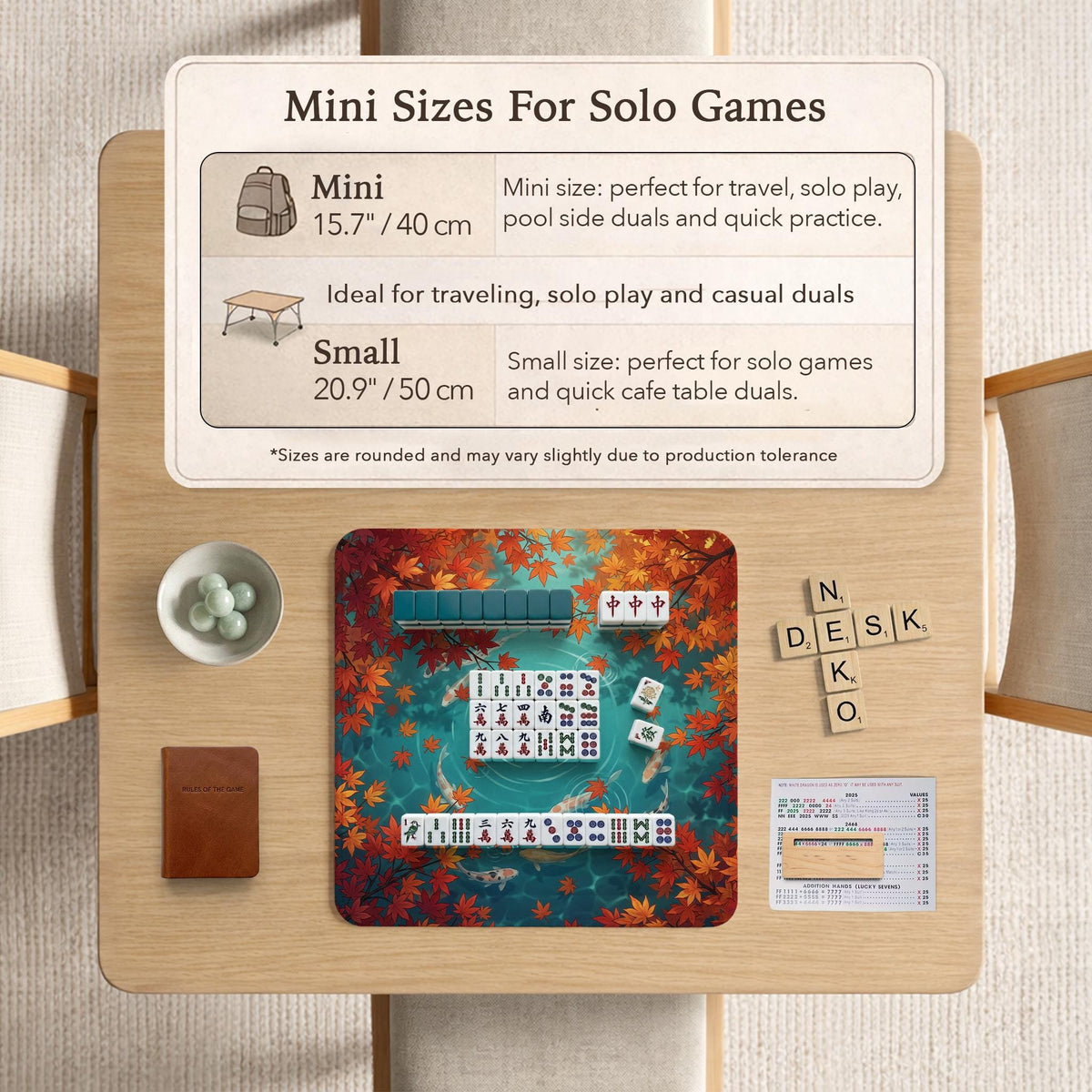 Square teal mahjong mat with koi fish, falling autumn leaves, and pond water artwork.
