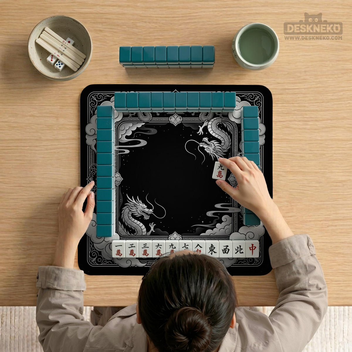 Square mahjong table mat with a black and silver dragon border, cloud details, and a scalloped edge.