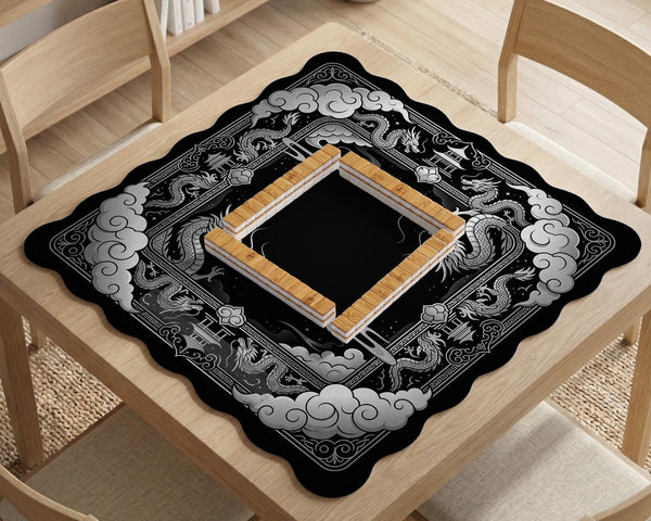 Square mahjong table mat with a black and silver dragon border, cloud details, and a scalloped edge.