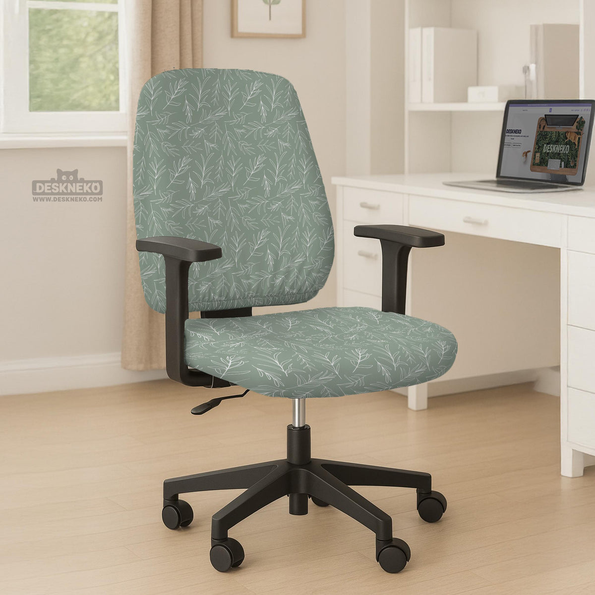 Office chair cover in muted sage green with a light leaf pattern on a white background.