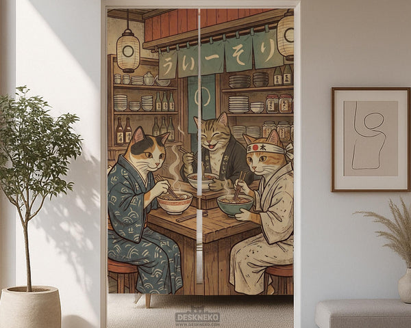 A split-panel Japanese noren curtain showing a ramen shop scene with three cats, warm lantern light, and vintage-style artwork in beige, muted teal, and brown tones.