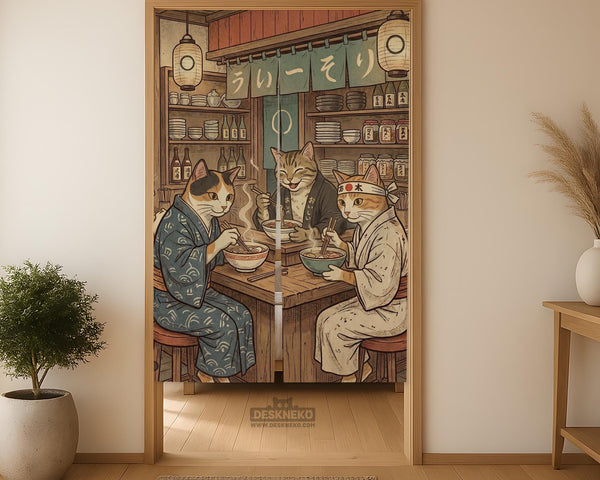 A split-panel Japanese noren curtain showing a ramen shop scene with three cats, warm lantern light, and vintage-style artwork in beige, muted teal, and brown tones.