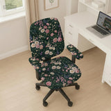 Green chair cover with a dark floral pattern, pink roses, cream flowers, and leafy botanical details on an office chair.