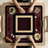 Square burgundy mahjong mat with a cherry blossom floral border and a dark open center.