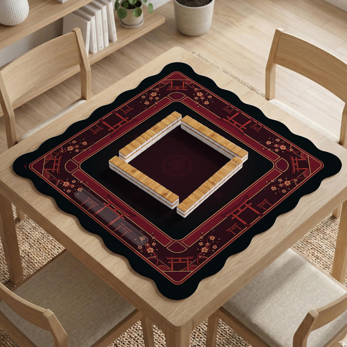 Square burgundy mahjong mat with a cherry blossom floral border and a dark open center.