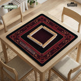 Square burgundy mahjong mat with a cherry blossom floral border and a dark open center.
