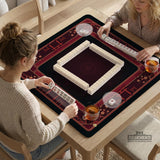 Square burgundy mahjong mat with a cherry blossom floral border and a dark open center.