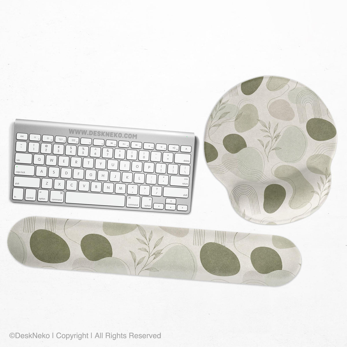 Green abstract botanical mouse pad with a rounded organic pattern and matching keyboard wrist rest option.