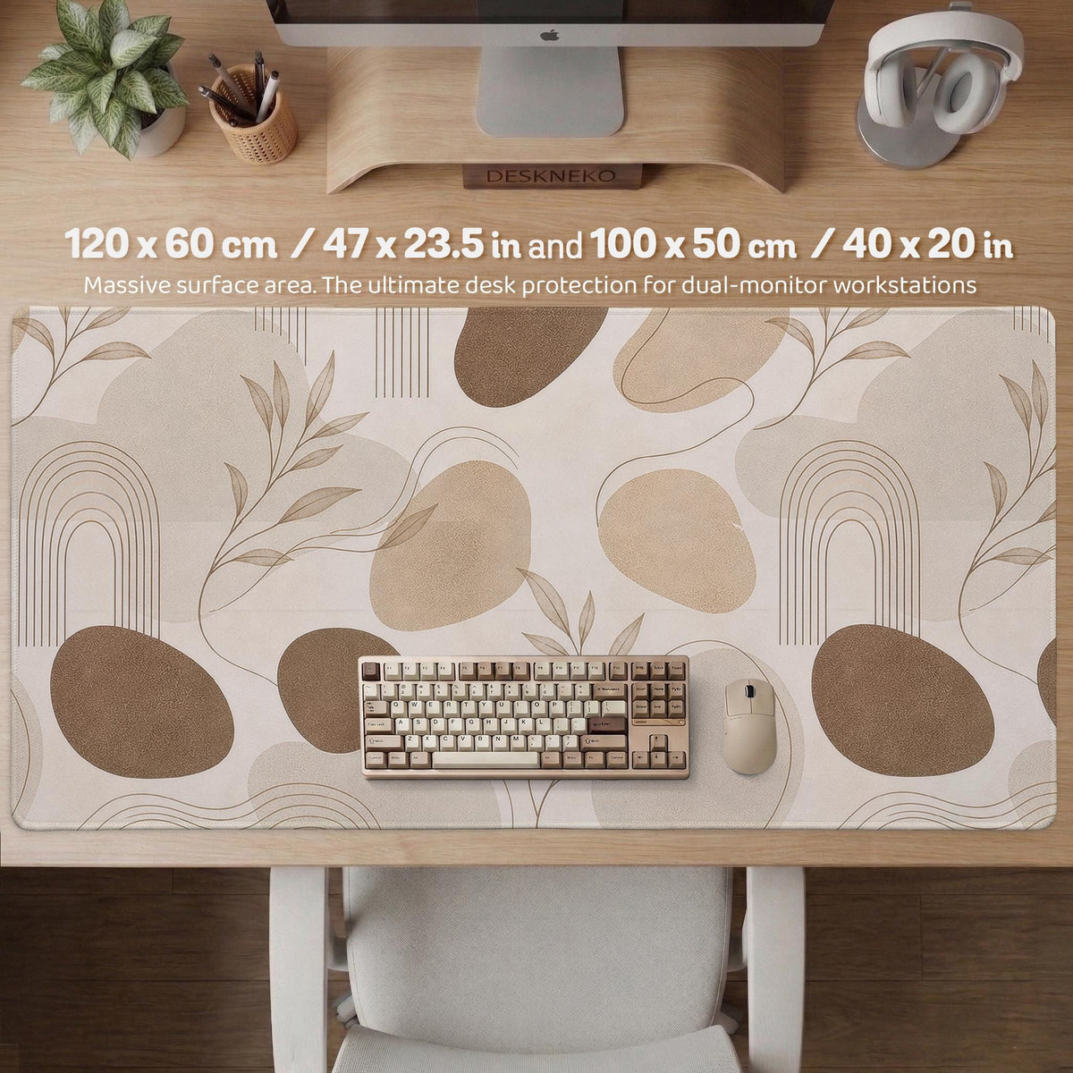 Beige desk mat with fine botanical line drawings and soft abstract shapes on a light neutral background.