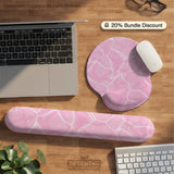 Soft pink mouse pad and wrist rest with a cloud-marble pattern, pale linework, and small star details.