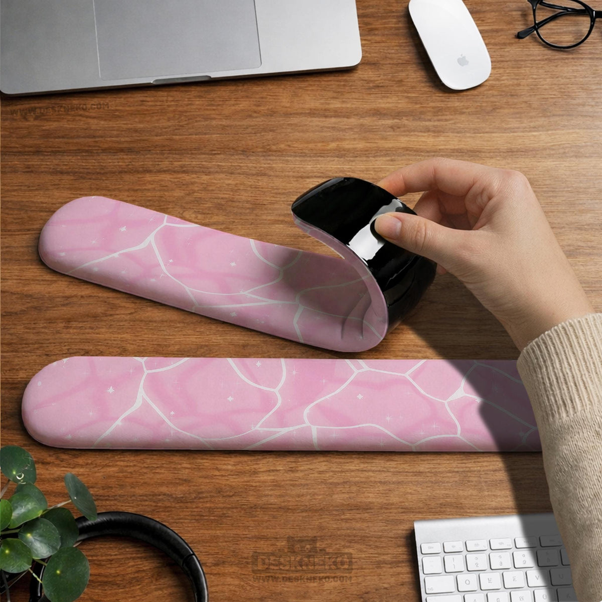 Soft pink mouse pad and wrist rest with a cloud-marble pattern, pale linework, and small star details.