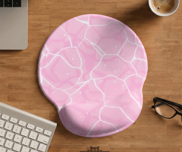 Soft pink mouse pad and wrist rest with a cloud-marble pattern, pale linework, and small star details.