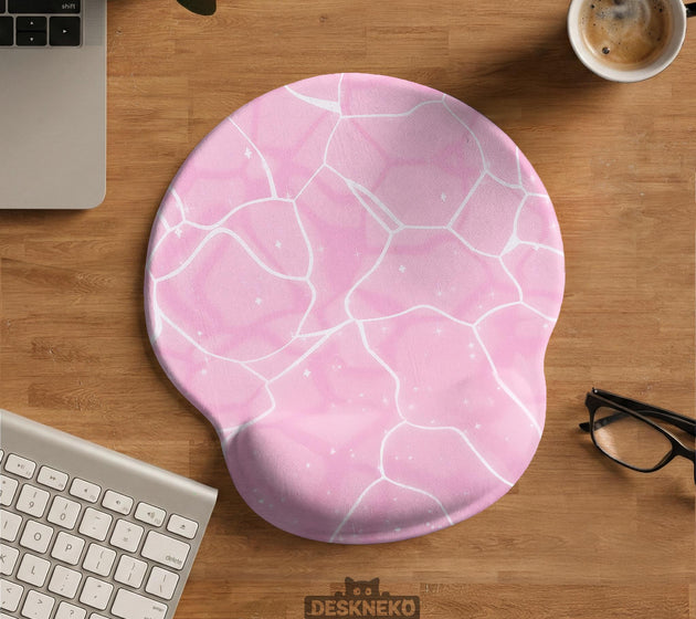 Soft pink mouse pad and wrist rest with a cloud-marble pattern, pale linework, and small star details.