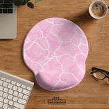 Soft pink mouse pad and wrist rest with a cloud-marble pattern, pale linework, and small star details.