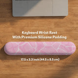 Soft pink mouse pad and wrist rest with a cloud-marble pattern, pale linework, and small star details.