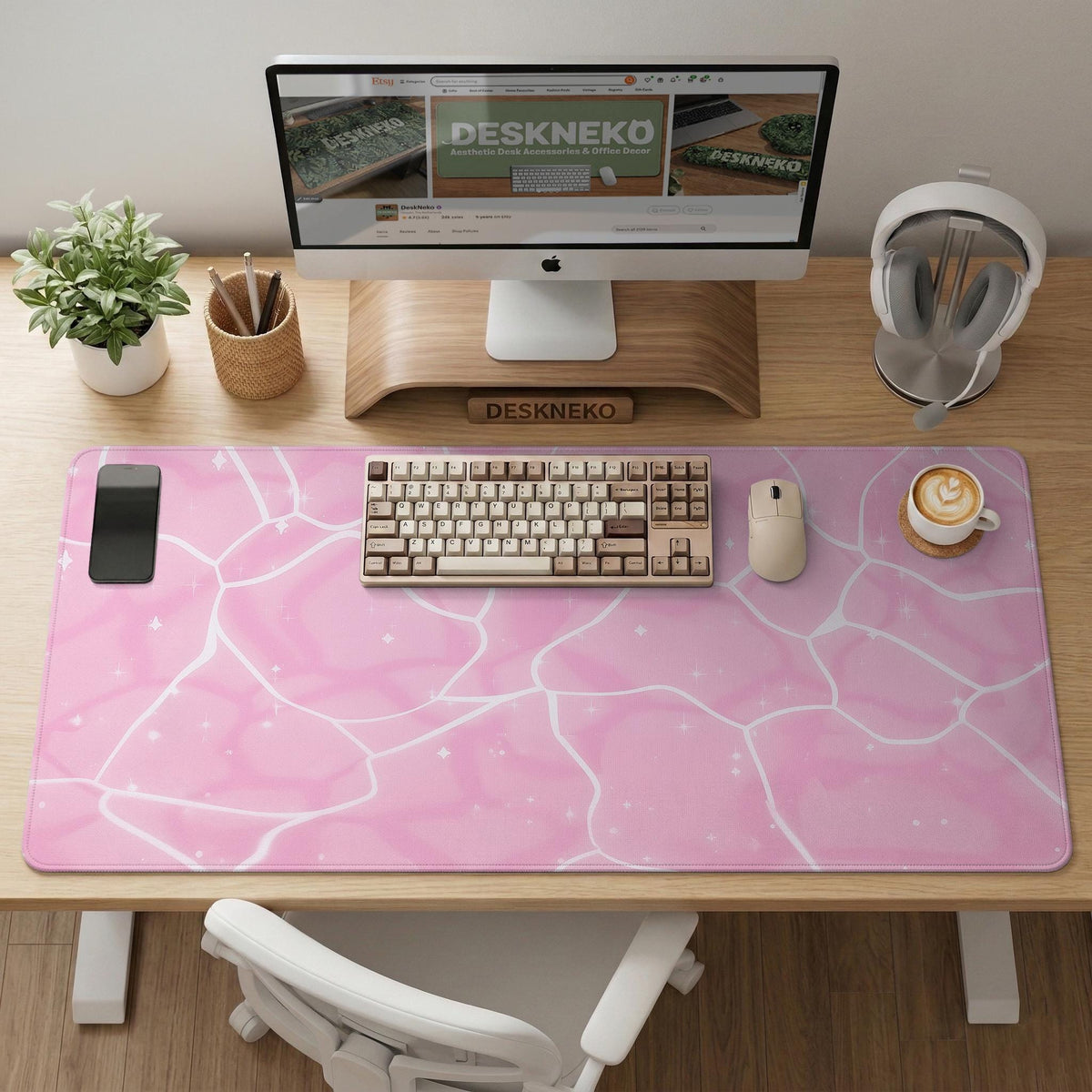 Soft pink desk mat with a kawaii cloud-marble pattern, white crackle lines, and small star accents.