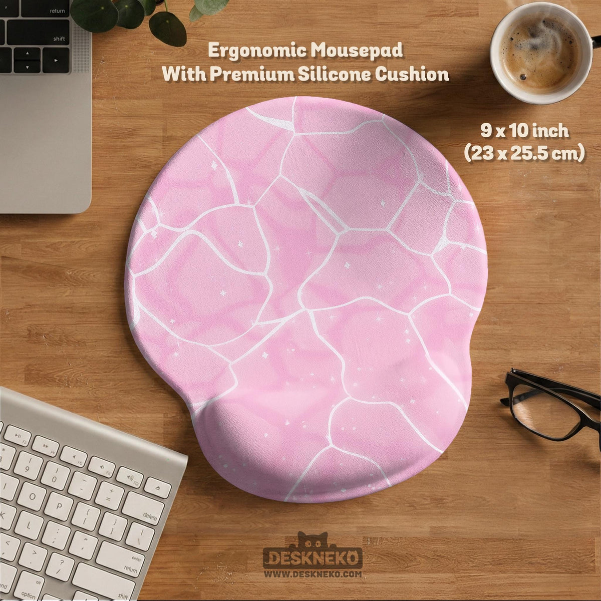 Pastel pink desk mat with a marble-style design, white flowing lines, and small sparkle accents.