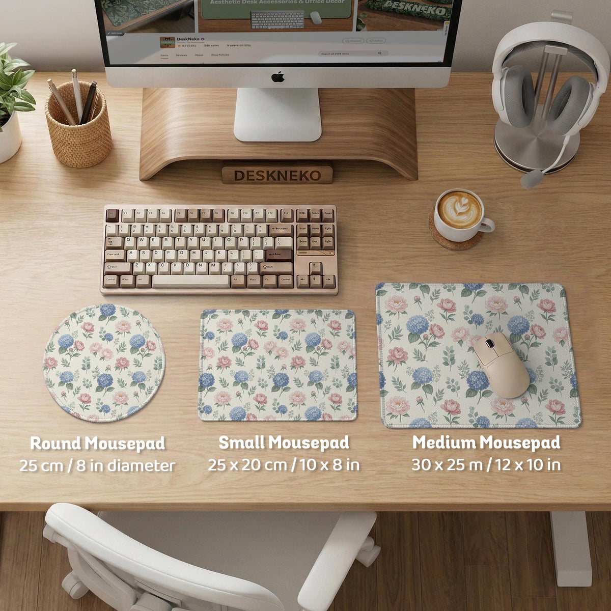 Floral desk mat with sage greenery, pink peonies, blue flowers, and a warm cream background.