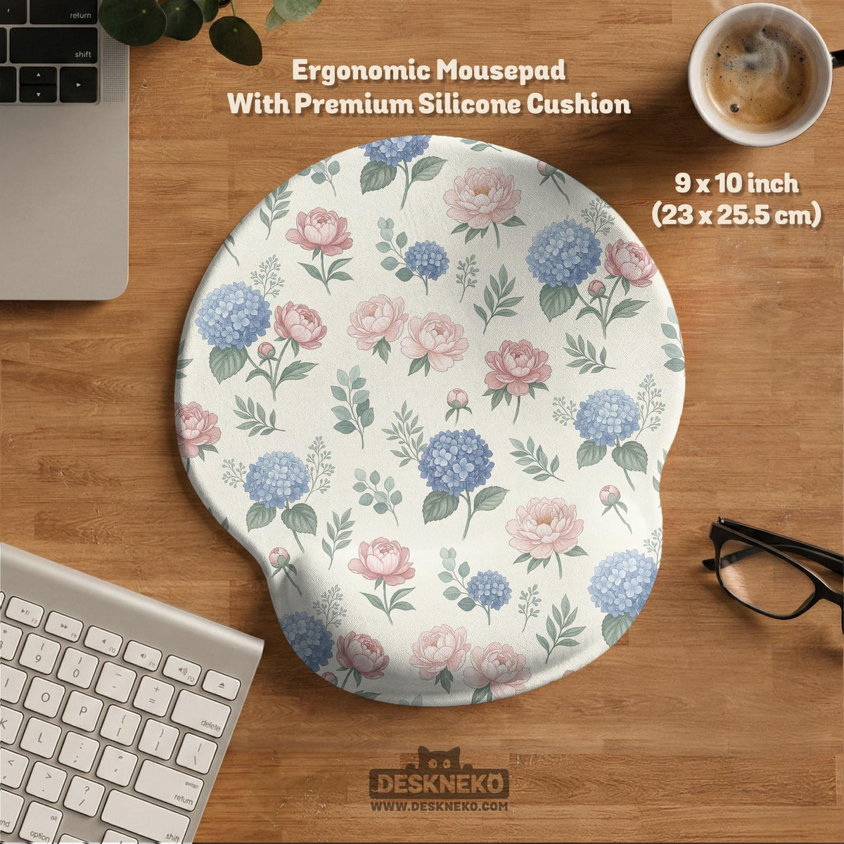 Floral desk mat with sage greenery, pink peonies, blue flowers, and a warm cream background.