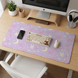 Pastel lavender desk mat with an all-over pattern of bunnies, crescent moons, clouds, bows, stars, and small flowers.