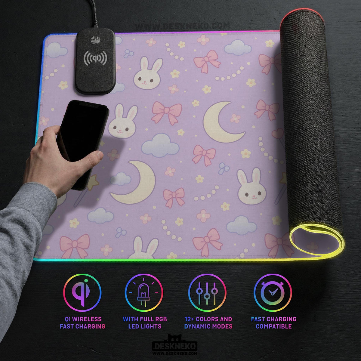 Lavender desk mat with an all-over pattern of bunny faces, clouds, moons, bows, and flowers in pastel colors.