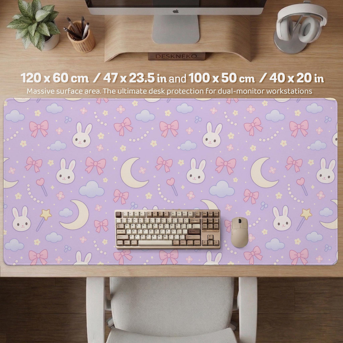 Pastel lavender desk mat with an all-over pattern of bunnies, crescent moons, clouds, bows, stars, and small flowers.