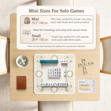 Square mahjong mat with a light floral border in sage green, cream, and blush around a plain center play area.
