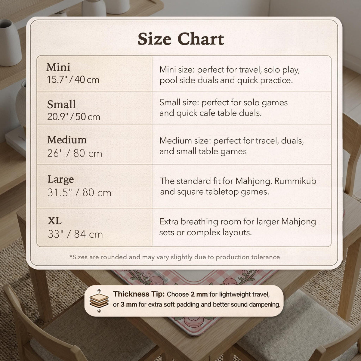 Pink gingham mahjong mat with a floral border, cherry blossom details, and a bow design around a plain center play area.