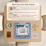 Blue and white square mahjong mat with a koi fish and lotus border design and a plain center area.