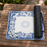 Blue and white square mahjong mat with a koi fish and lotus border design and a plain center area.