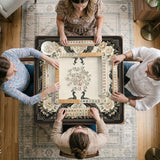 Cream mahjong table mat with a chinoiserie floral border, dark peacocks, soft gold linework, and an open center area.