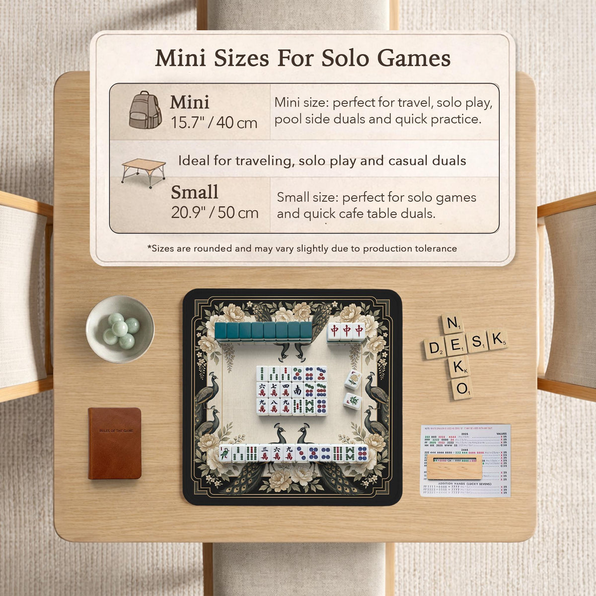 Square ivory mahjong mat with a black peacock border, cream flowers, and gold accent details.