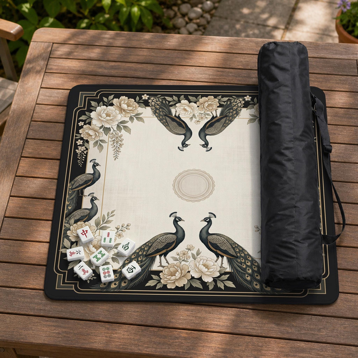 Square ivory mahjong mat with a black peacock border, cream flowers, and gold accent details.