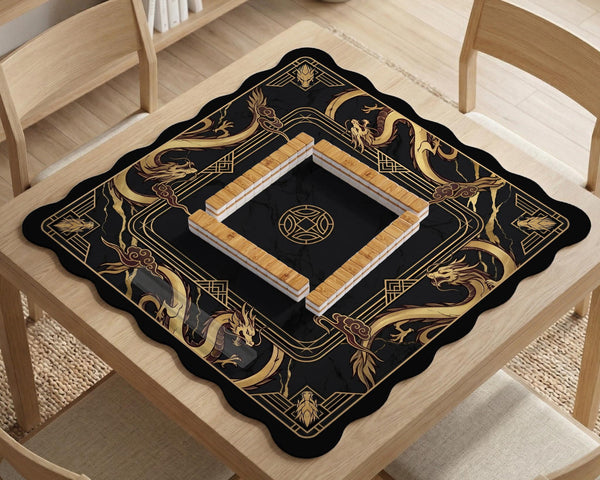 Square black mahjong mat with gold dragon artwork around the border and a light marble texture in the center.