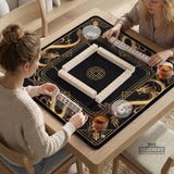 Black mahjong table mat with a gold dragon border, gold geometric corner details, and a clear center play area.