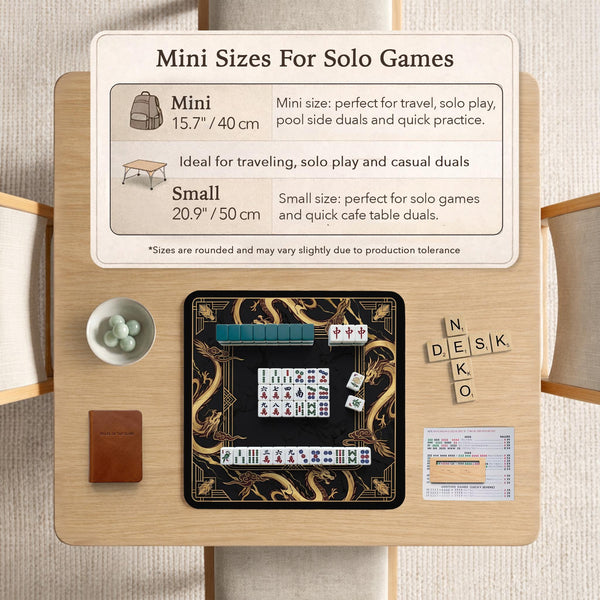 Black mahjong table mat with a gold dragon border, gold geometric corner details, and a clear center play area.